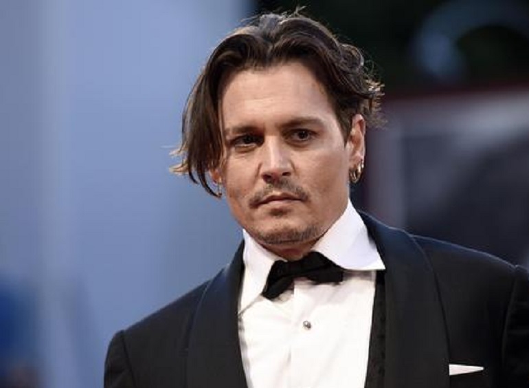 Pirati dei Caraibi, Johnny Depp potrebbe non essere nel cast del nuovo capitolo (foto Ansa)