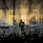 I Massive Attack sul palco durante un concerto