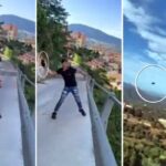 ragazzo lancia gattino da un ponte