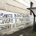 Scritte su un muro che inneggiano agli assassini di Marco Biagi