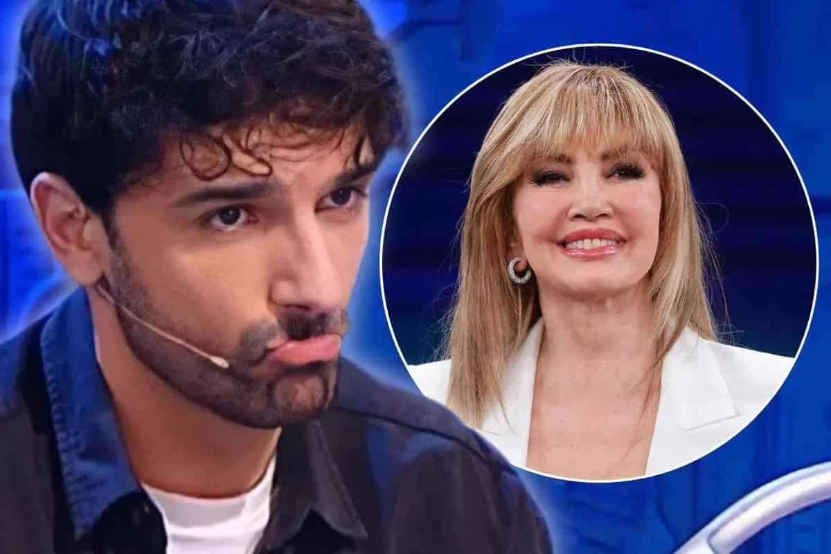 raimondo todaro preoccupato e milly carlucci sorridente