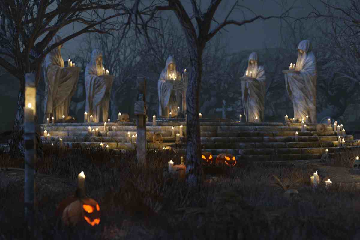 location notturna con statue e candele la notte di Halloween