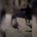 un'immagine della brutale aggressione ai danni di due giovani a Milano