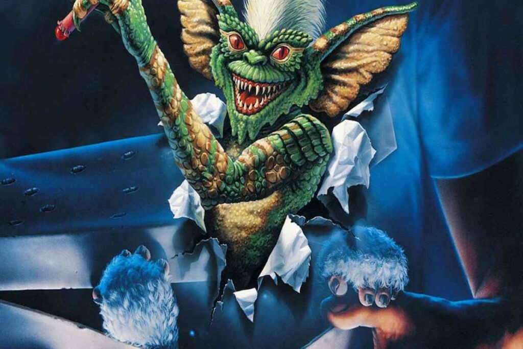 La locandina del film Gremlins, di Joe Dante, con l'iconico mostriciattolo in evidenza