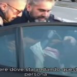 Nella foto tratta dal video, il momento del fermo di un attivista a Brescia