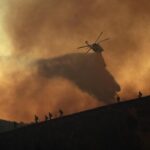 Wildfires continue to rage through Los Angeles area