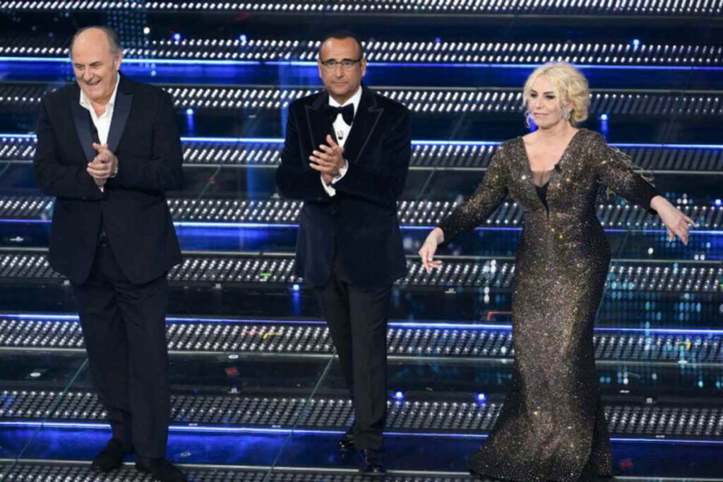 carlo conti con gerry scotti e antonella clerici a sanremo